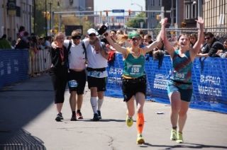 Me and Kat crossing the finish line at the Buffalo Marathon - Buffalo, New York. This picture encapsulates everything about the marathon. (Photo Credit: Diane Sardes)