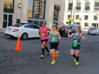 Janelle, Me, and Kat at the 13.1 mile point of the Buffalo Marathon! Feeling strong. Looking strong!